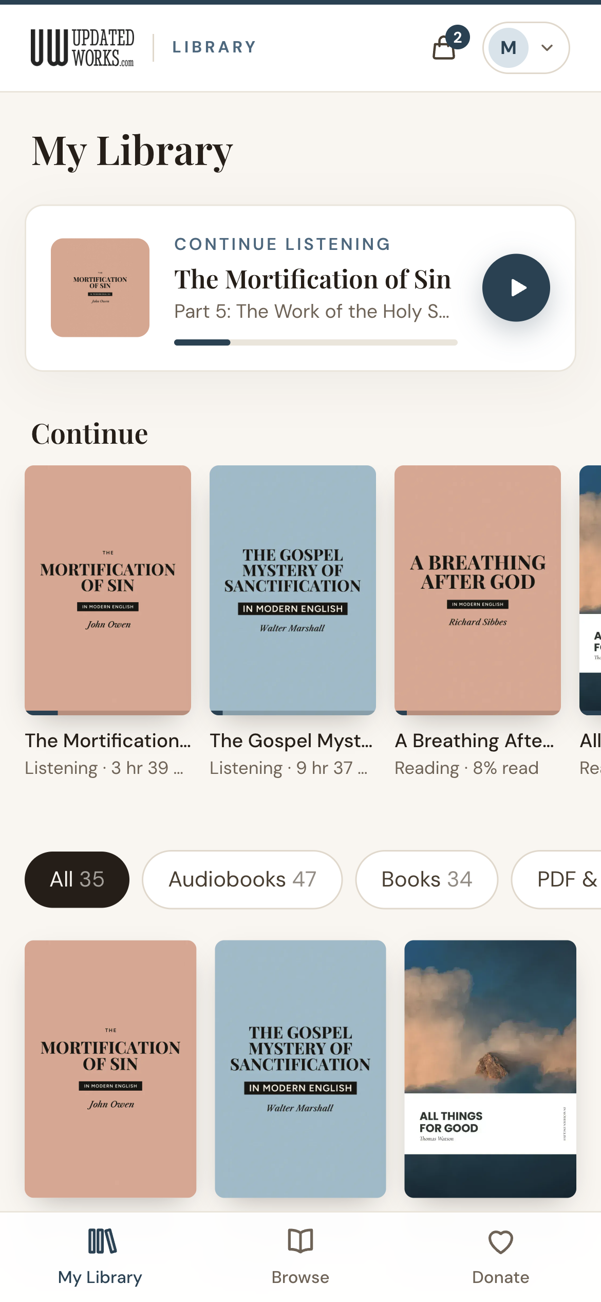 My Library on a phone, with a book to continue reading and the cover grid